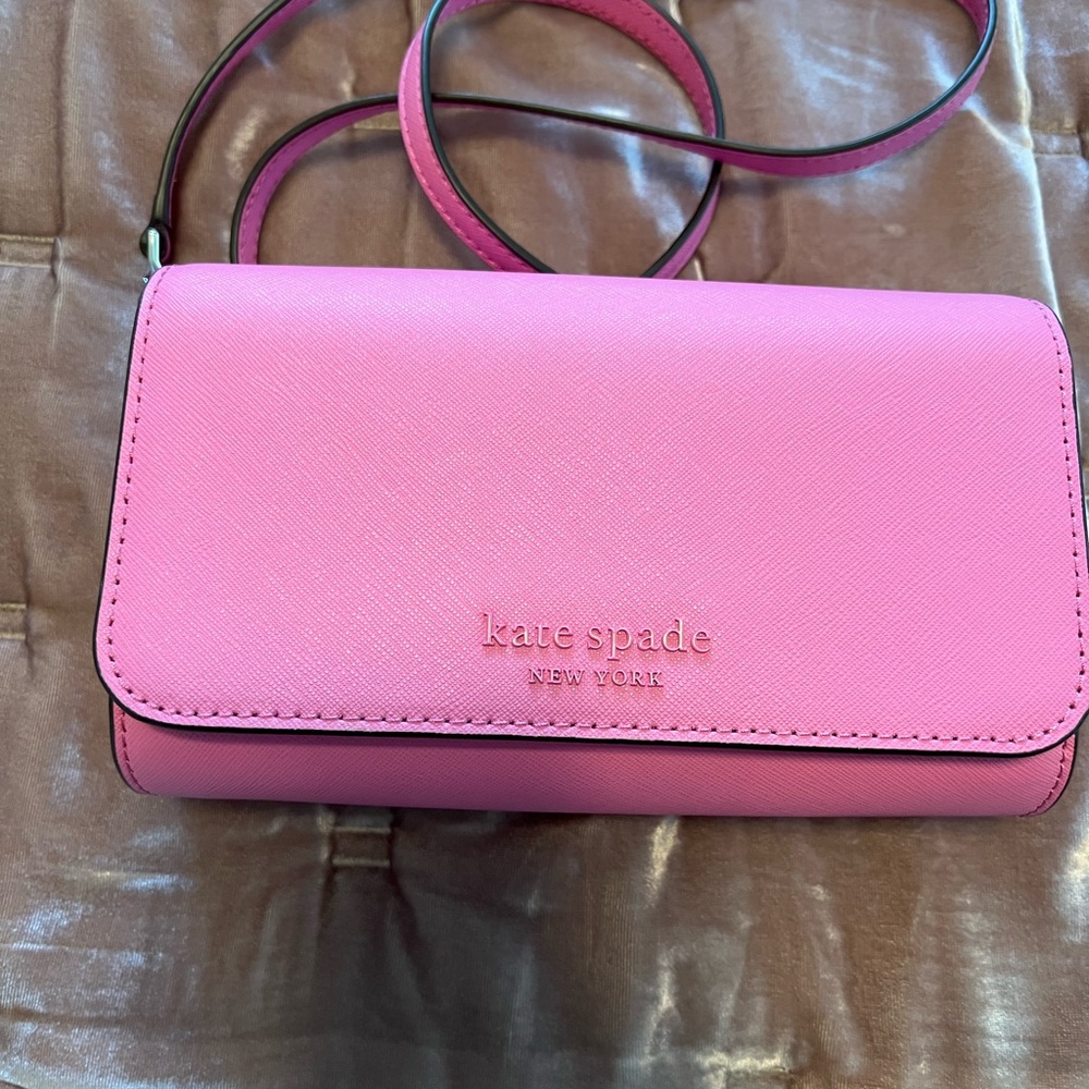 Kate Spade pink cross body purse. Used once for a special occasion.